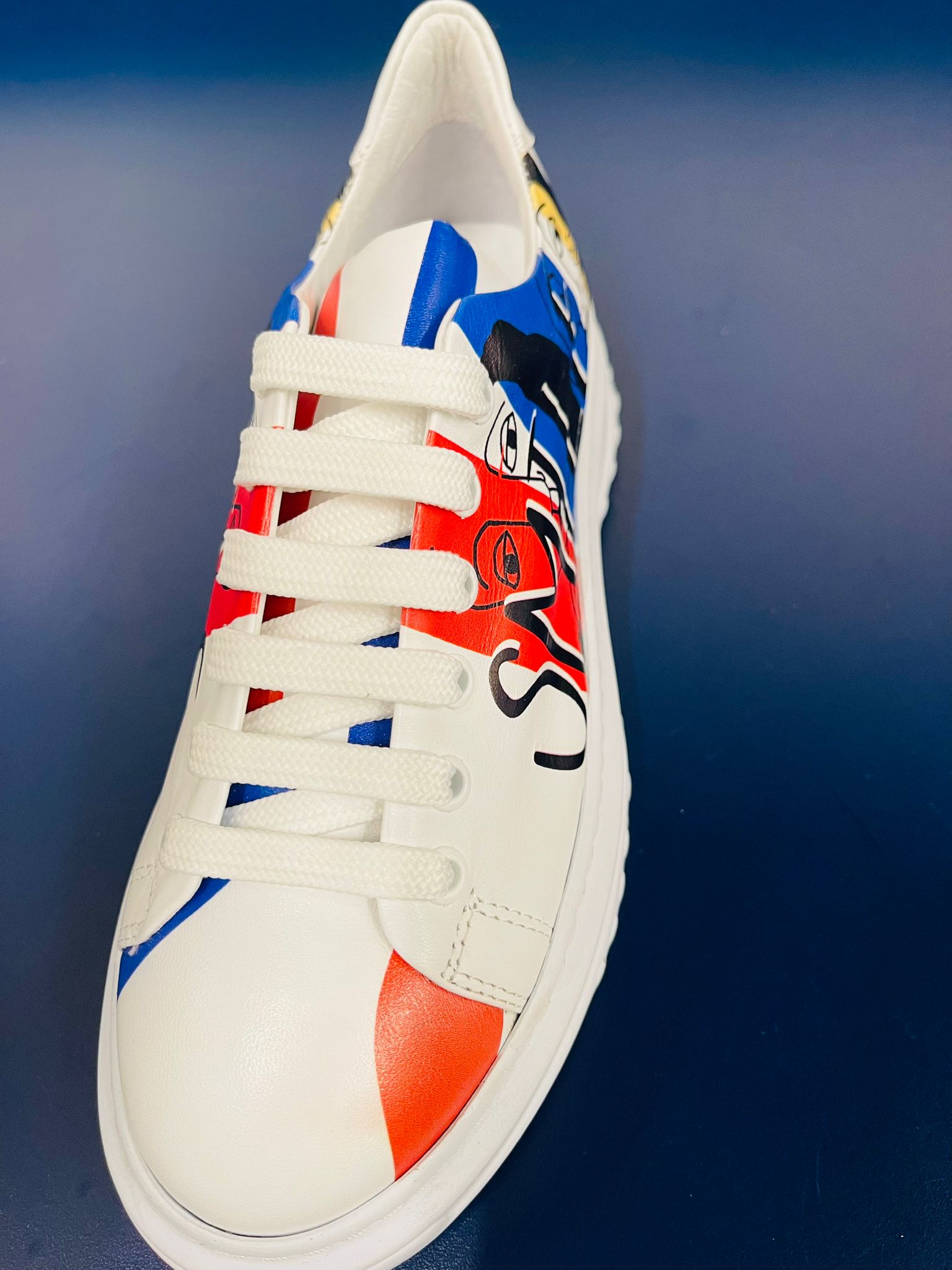 White Sneaker With Design On The Side