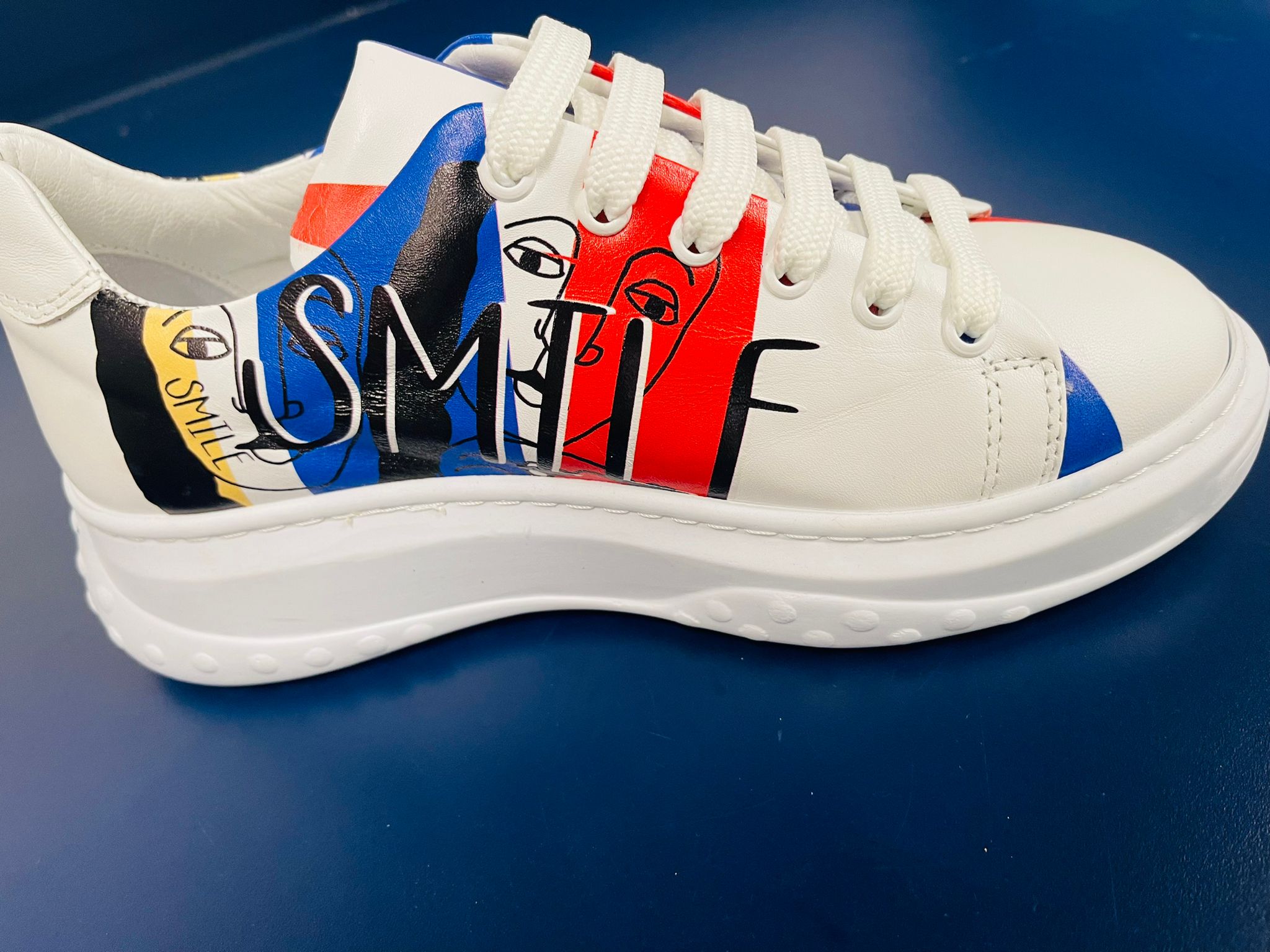 White Sneaker With Design On The Side