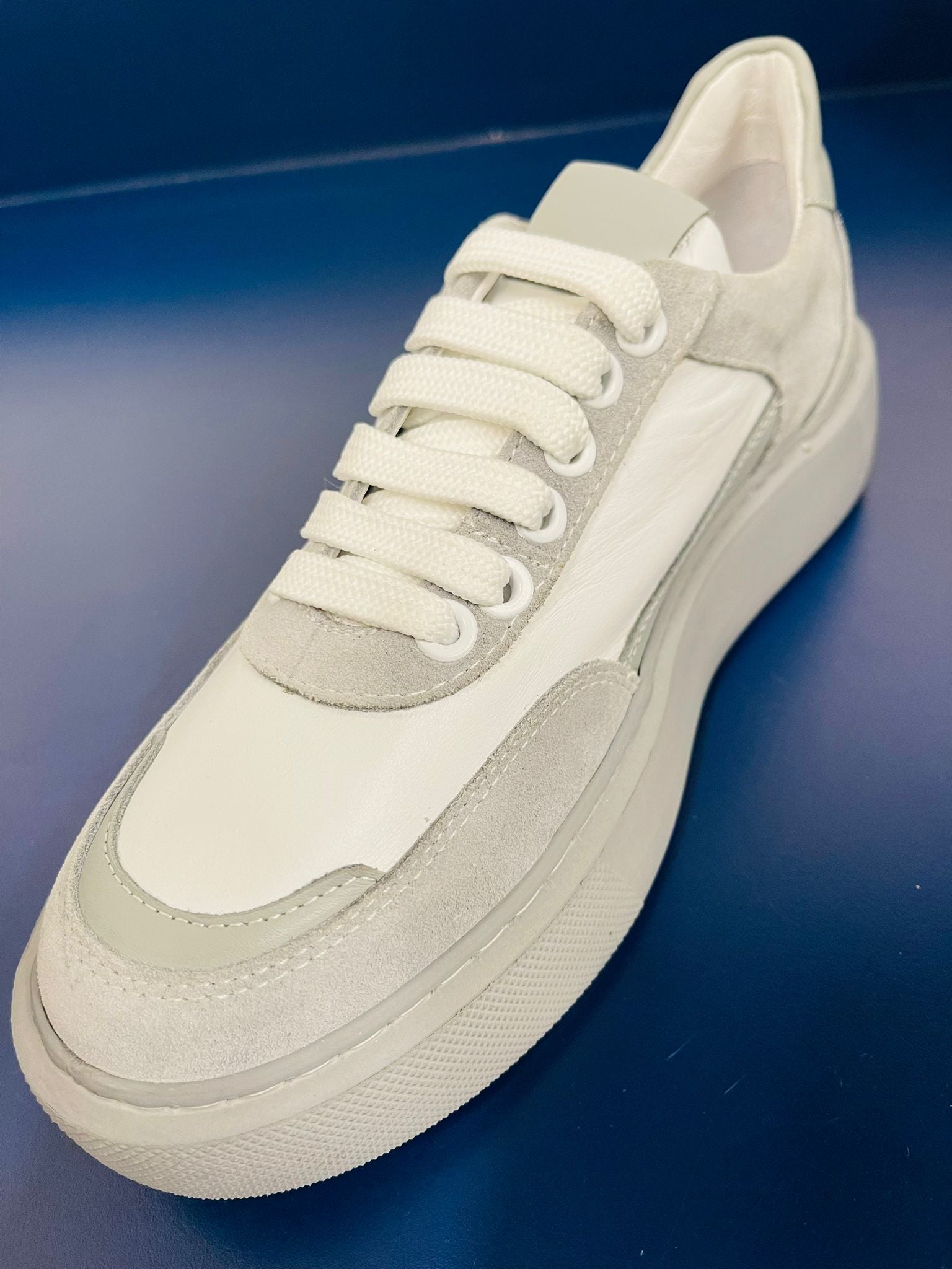 White And Gray Tennis Shoes